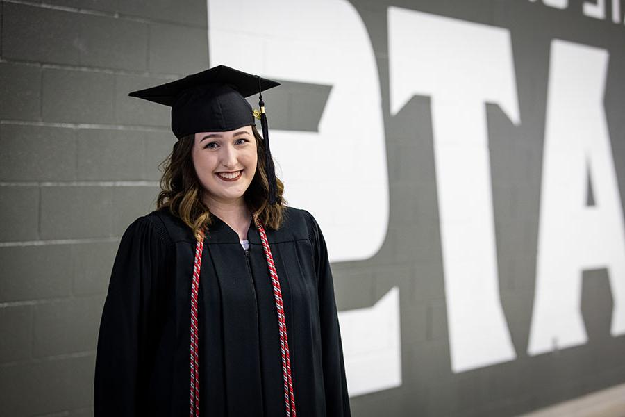 Rhiannon Hopkins, graduated from Northwest on May 7 with her bachelor’s degree in speech and theater education and is becoming a forensics coach and theater director next fall in the Independence School District. (Photo by Todd Weddle/Northwest Missouri State University)